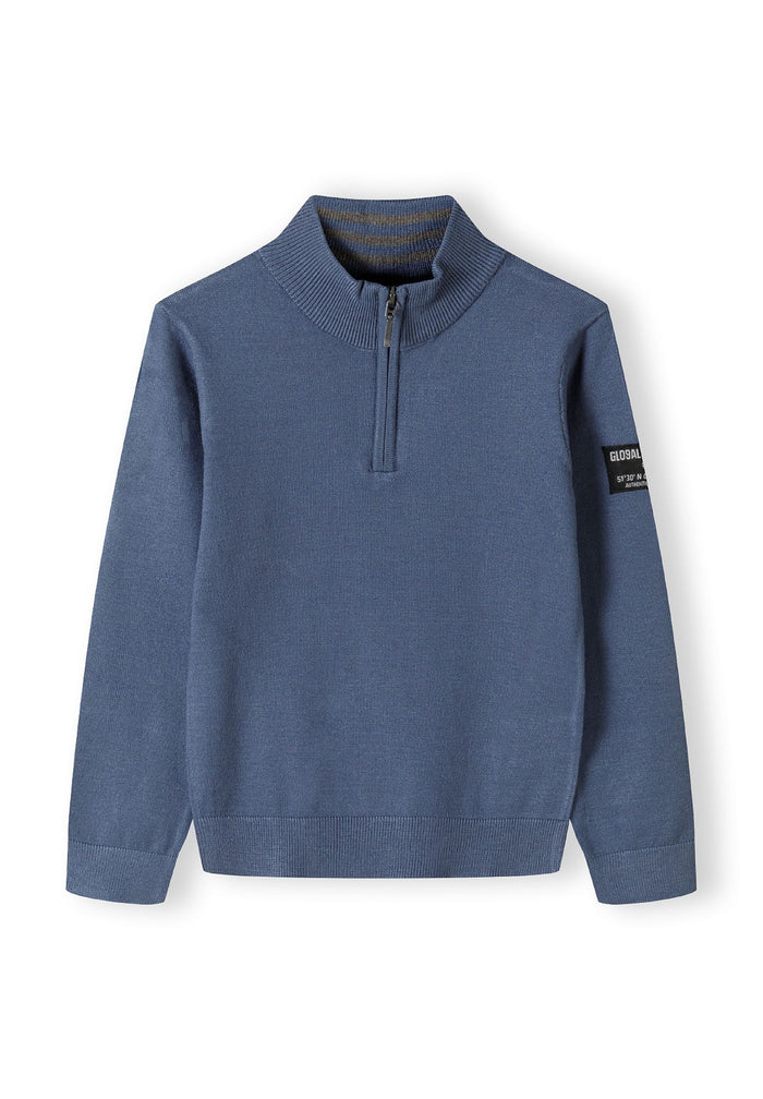 Boys half zip jumper in solid blue with ribbed cuffs, front view.
