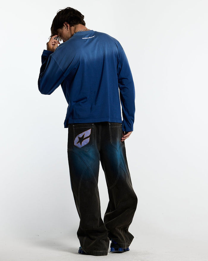 CROSSED SCRIPT LONGSLEEVE VIBRANT BLUE - washed blue script print longsleeve tee, back view on male model - Cold Culture #man