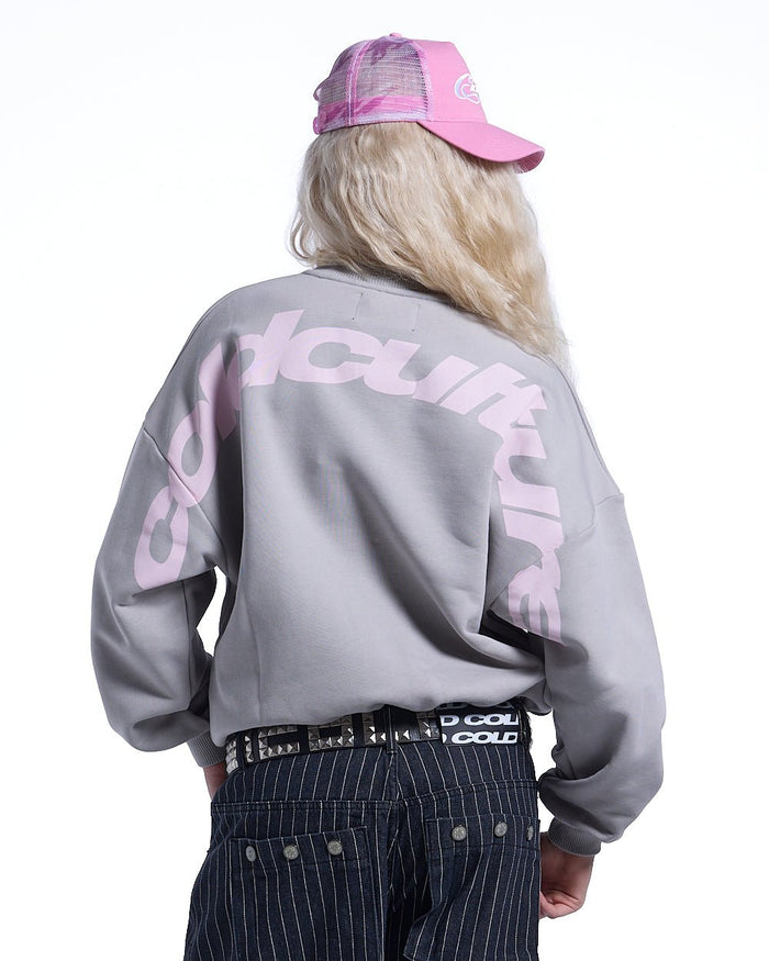 CURVED CREWNECK GREY - grey oversized crewneck sweatshirt, back view on female model - Cold Culture #woman