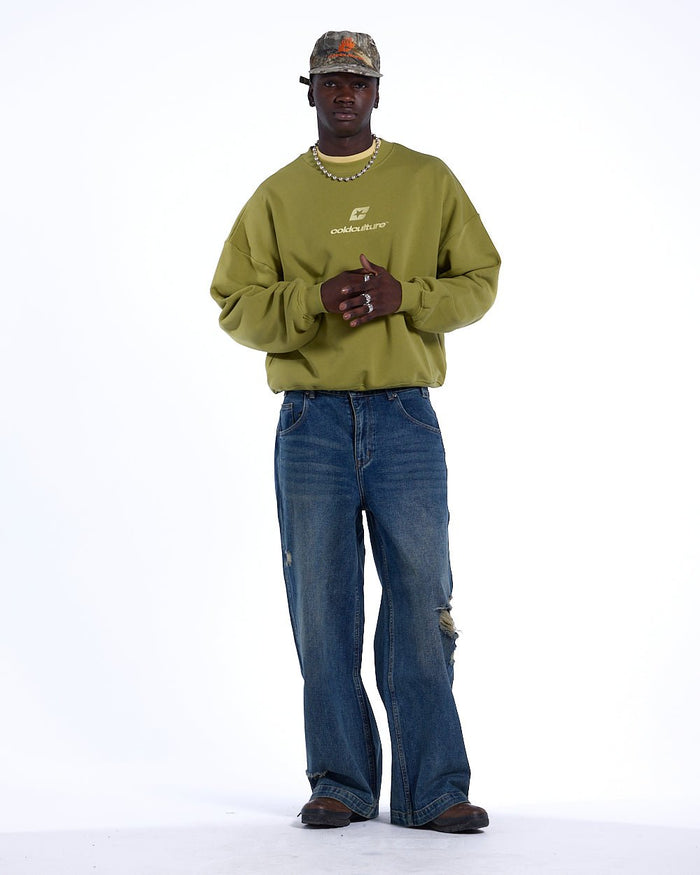CURVED CREWNECK LIGHT GREEN - light green oversized crewneck sweatshirt, front view on male model - Cold Culture #man