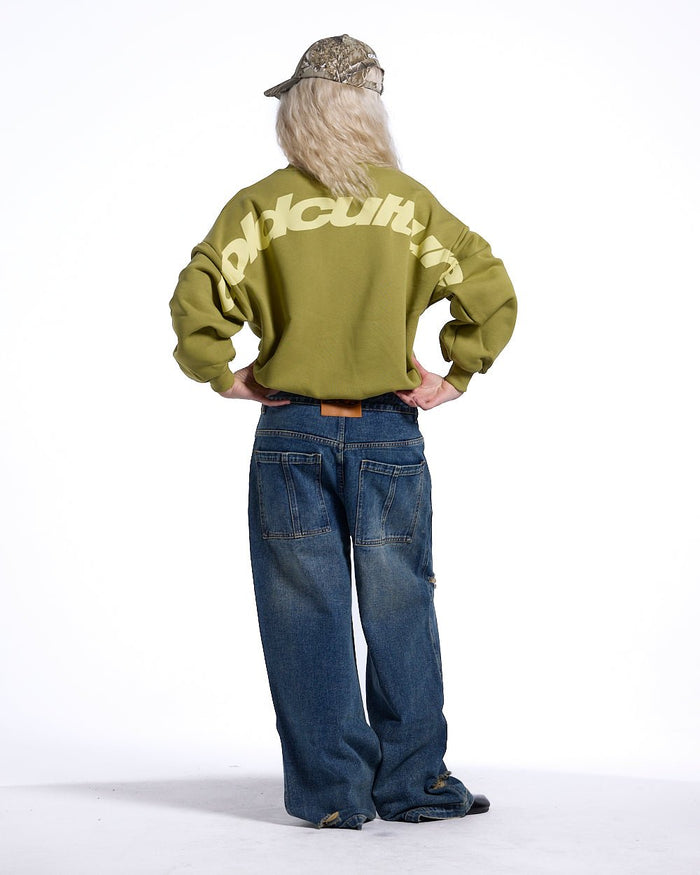 CURVED CREWNECK LIGHT GREEN - light green oversized crewneck sweatshirt, back view on female model - Cold Culture #woman