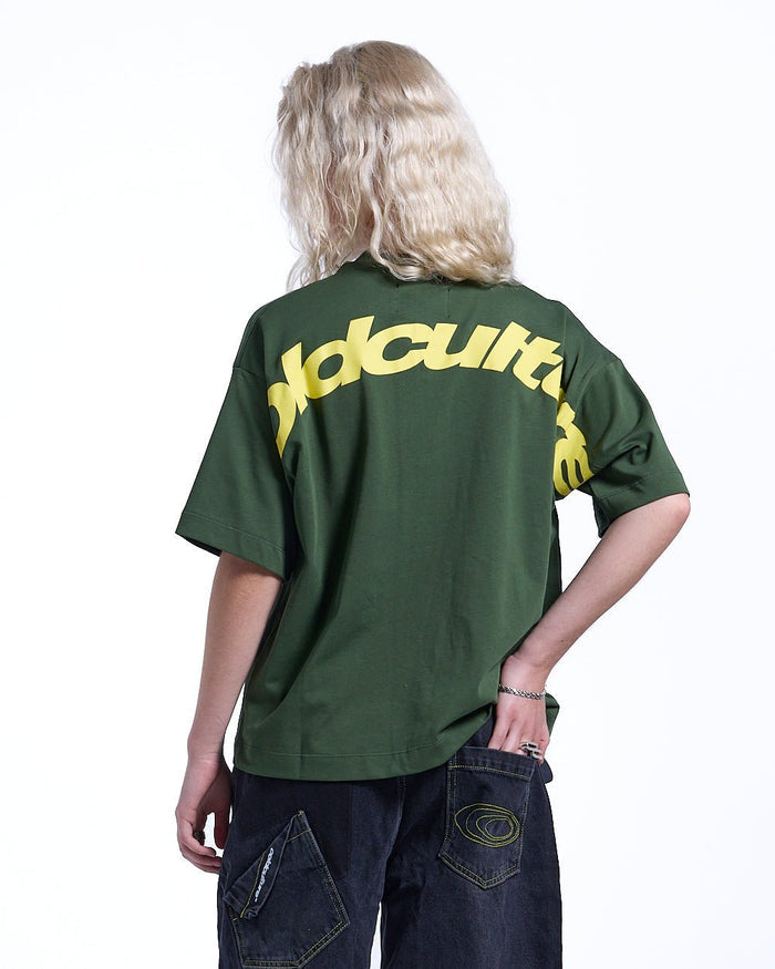 CURVED TEE GREEN & YELLOW - green oversized tee, back view on female model - Cold Culture #woman