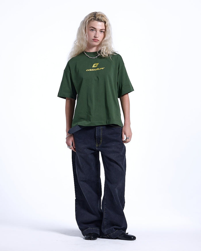CURVED TEE GREEN & YELLOW - green oversized tee, front view on female model - Cold Culture #woman