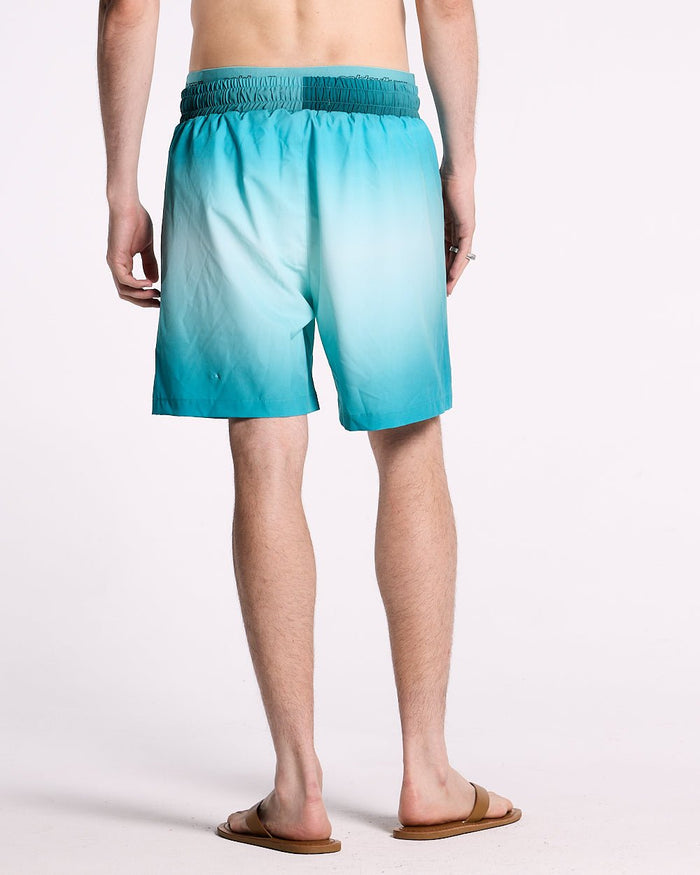 DOUBLE WAIST SWIM SHORTS GRADIENT BLUE - blue gradient swim shorts, back view on male model - Cold Culture