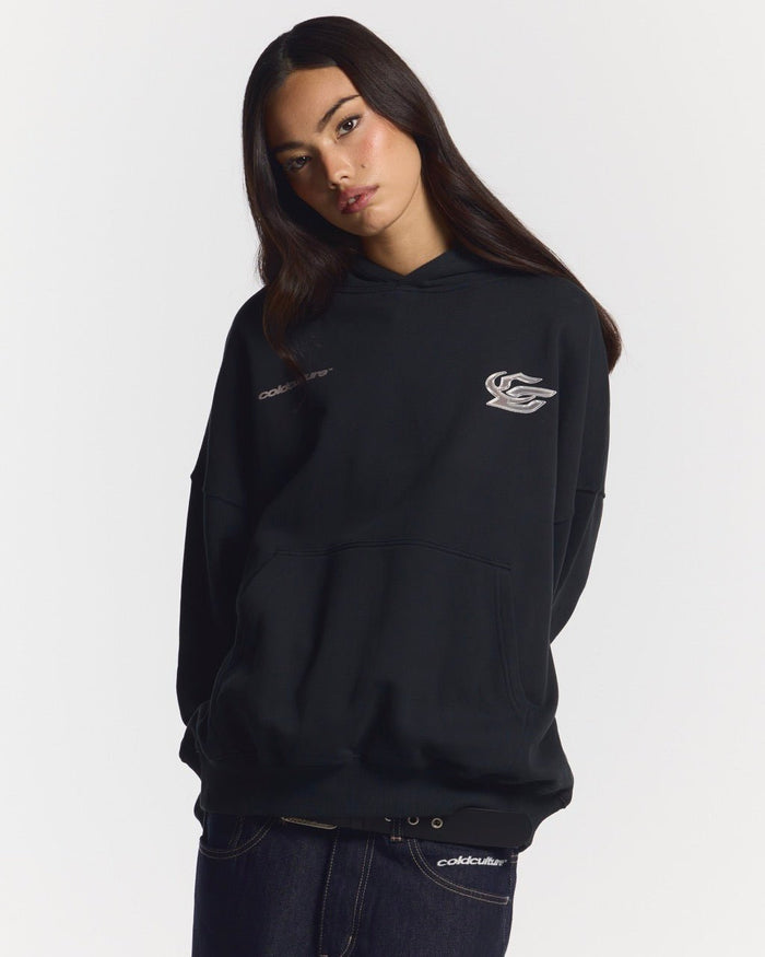 HYPERCHROME HOODIE BLACK - black oversized hoodie, front view on female model - Cold Culture #woman