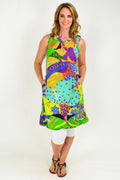 Orientique Palermo sleeveless tunic dress with a roll neck, featuring a flowy fabric and elegant design, shown on a model.