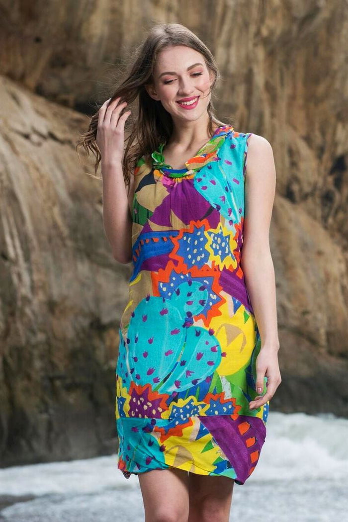 Orientique Palermo sleeveless tunic dress with a roll neck, featuring a relaxed fit and stylish design for casual wear.