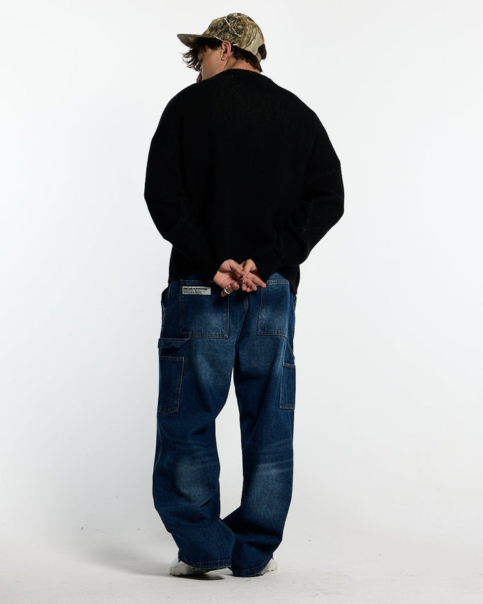 POISON KNIT BLACK AND GREEN - black graphic print knit sweater, back view on male model - Cold Culture #man