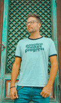 man wearing mc yogi Practice Makes Progress - Grey/Black Ringer Tee