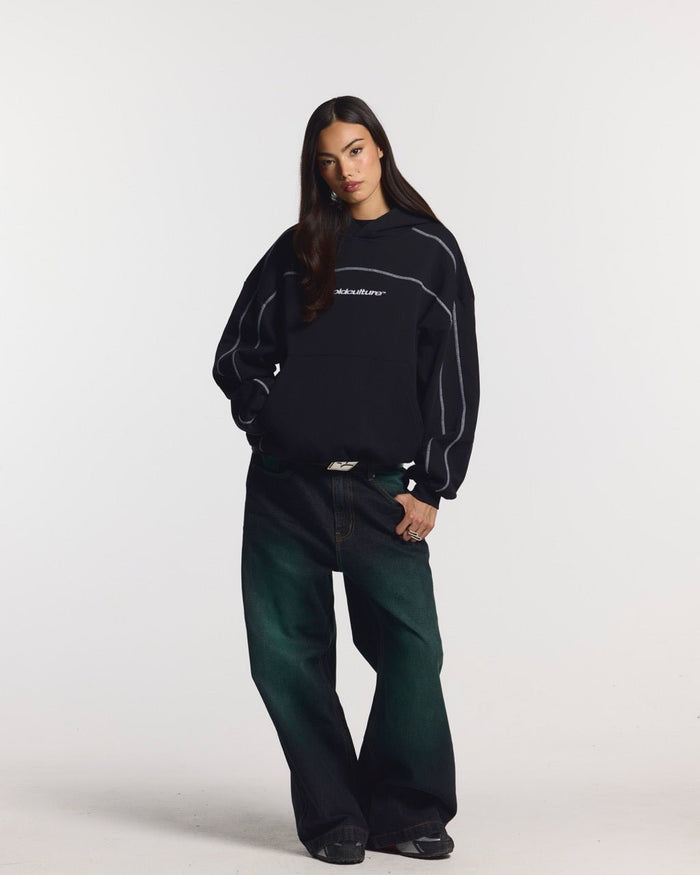 PRECIOUS V3 PANTS BLACK & GREEN - black and green denim pants, front view on female model - Cold Culture #woman