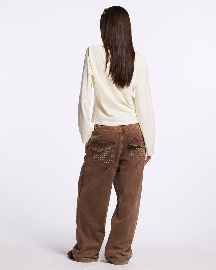 SCRIPT LONGSLEEVE TEE WHITE - white script print longsleeve tee, back view on female model - Cold Culture #woman