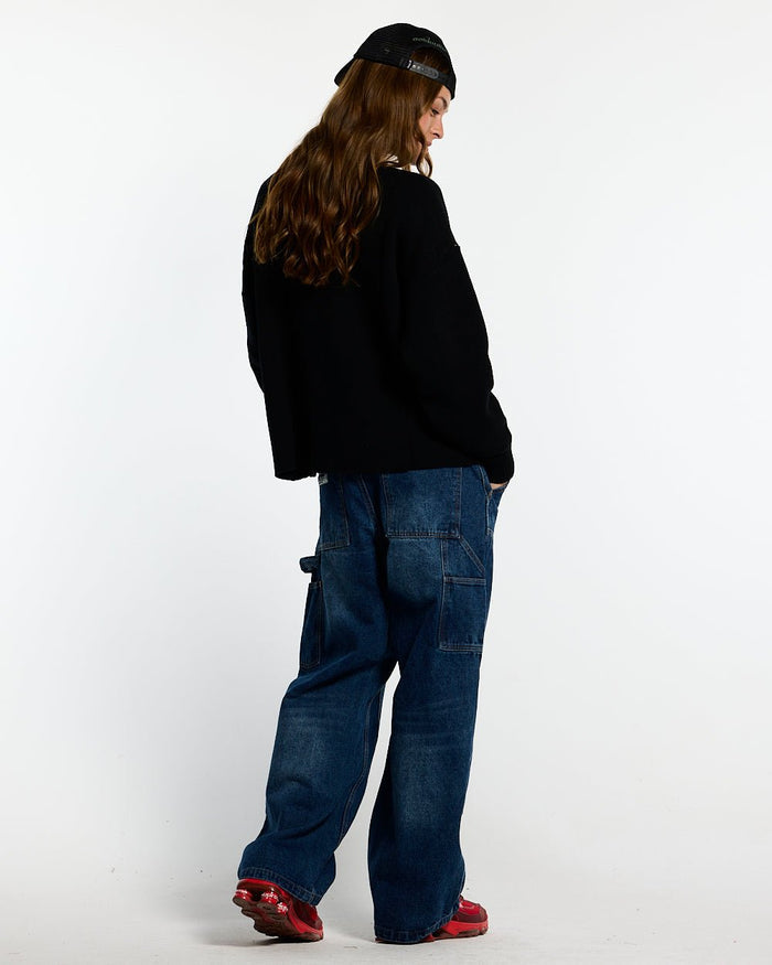 SPIDER KNIT BLACK - black spider print knit sweater, back view on female model - Cold Culture #woman