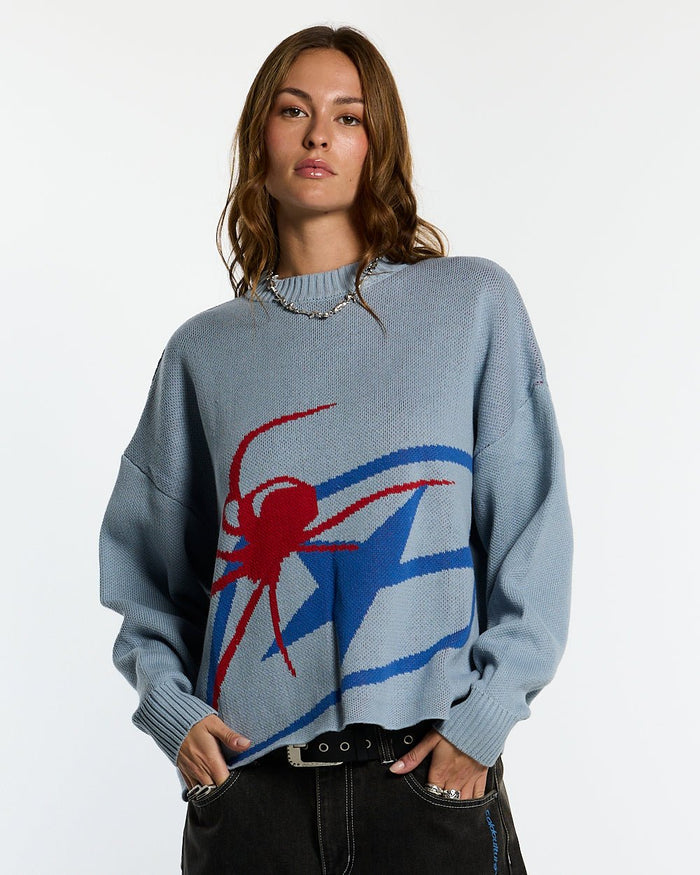 SPIDER KNIT LIGHT BLUE - light blue spider print knit sweater, front view on female model - Cold Culture #woman