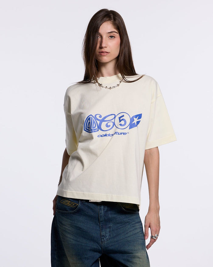 URBAN LEGACY TEE CREAM - cream graphic print tee, front view on female model - Cold Culture #woman