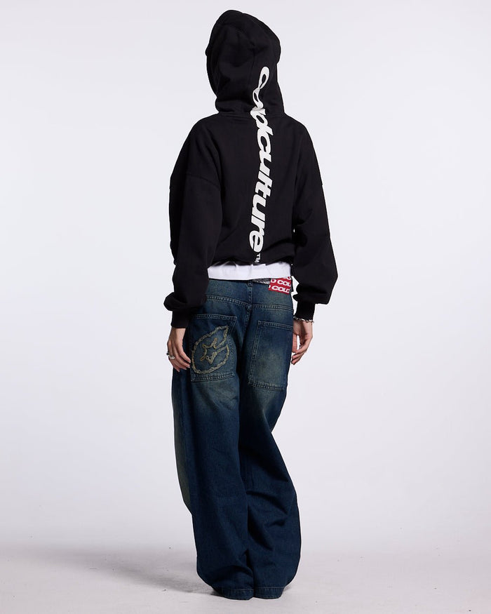 VERTICAL HOODIE BLACK - black vertical logo hoodie, back view on female model - Cold Culture #woman