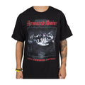 A person wears a black Armored Saint t-shirt with group artwork at the center, bold red Armored Saint text on top, and Win Hands Down in red at the bottom.