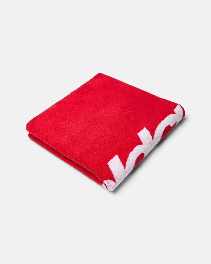 WORLDWIDE TOWEL VIVID RED AND WHITE - red and white beach towel, flat lay - Cold Culture