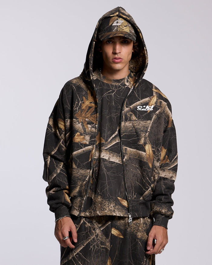 ZIP HOODIE REALTREE BLACK - black camo zip-up hoodie, front view on male model - Cold Culture #man